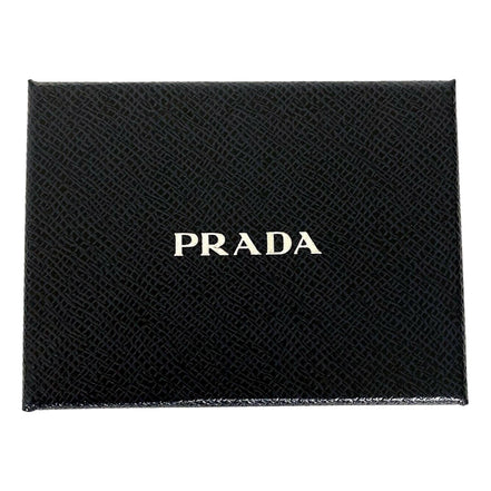 Prada Vitello Grain Black Leather Triangle Logo Vertical Bifold Wallet available at Queen Bee of Beverly Hills