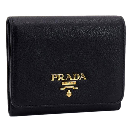 Prada Vitello Grain Black Trifold Compact Wallet Leather Logo Plaque available at Queen Bee of Beverly Hills