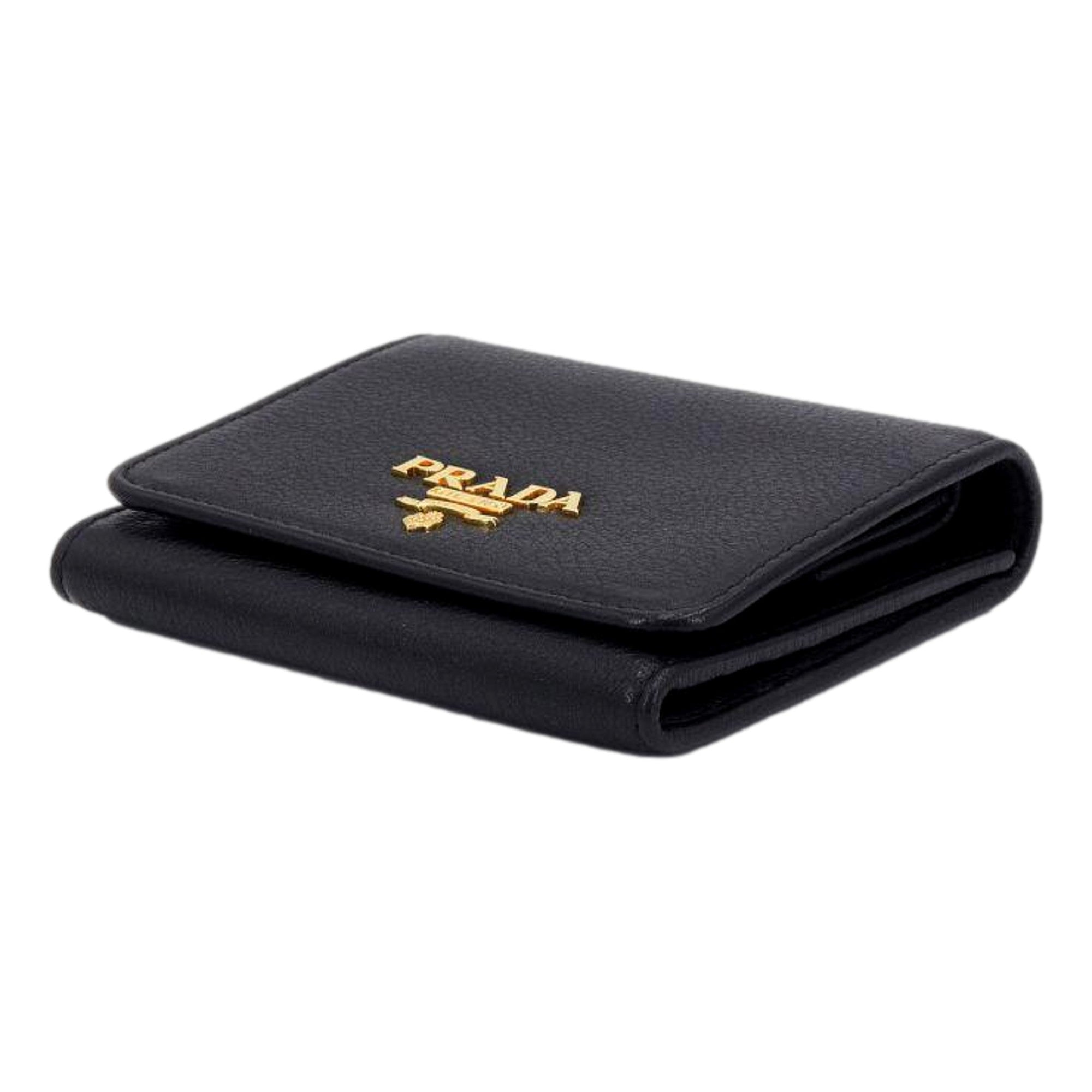 Prada Vitello Grain Black Trifold Compact Wallet Leather Logo Plaque available at Queen Bee of Beverly Hills