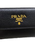 Prada Vitello Grain Nero Black Bifold ID Holder Snap Wallet available at Queen Bee of Beverly Hills
