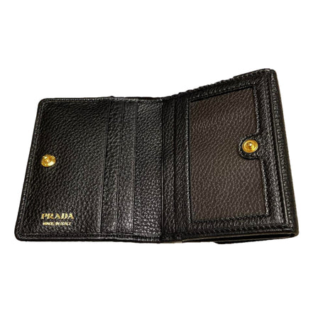 Prada Vitello Grain Nero Black Bifold ID Holder Snap Wallet available at Queen Bee of Beverly Hills