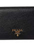 Prada Vitello Grain Nero Black Logo Leather Bifold Snap Wallet available at Queen Bee of Beverly Hills