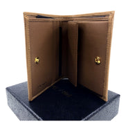 Prada Vitello Move Cipria Beige Leather Bifold Snap Wallet available at Queen Bee of Beverly Hills