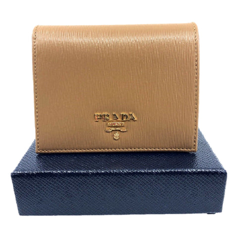 Prada Vitello Move Cipria Beige Leather Bifold Snap Wallet available at Queen Bee of Beverly Hills