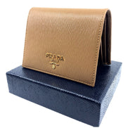 Prada Vitello Move Cipria Beige Leather Bifold Snap Wallet available at Queen Bee of Beverly Hills