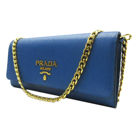 Prada Vitello Move Cobalto Blue Leather Chain Crossbody Wallet Clutch available at Queen Bee of Beverly Hills