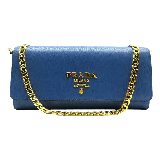 Prada Vitello Move Cobalto Blue Leather Chain Crossbody Wallet Clutch available at Queen Bee of Beverly Hills