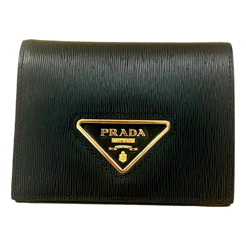 Prada Vitello Move Nero Black Triangle Logo Leather Bifold Snap Wallet available at Queen Bee of Beverly Hills