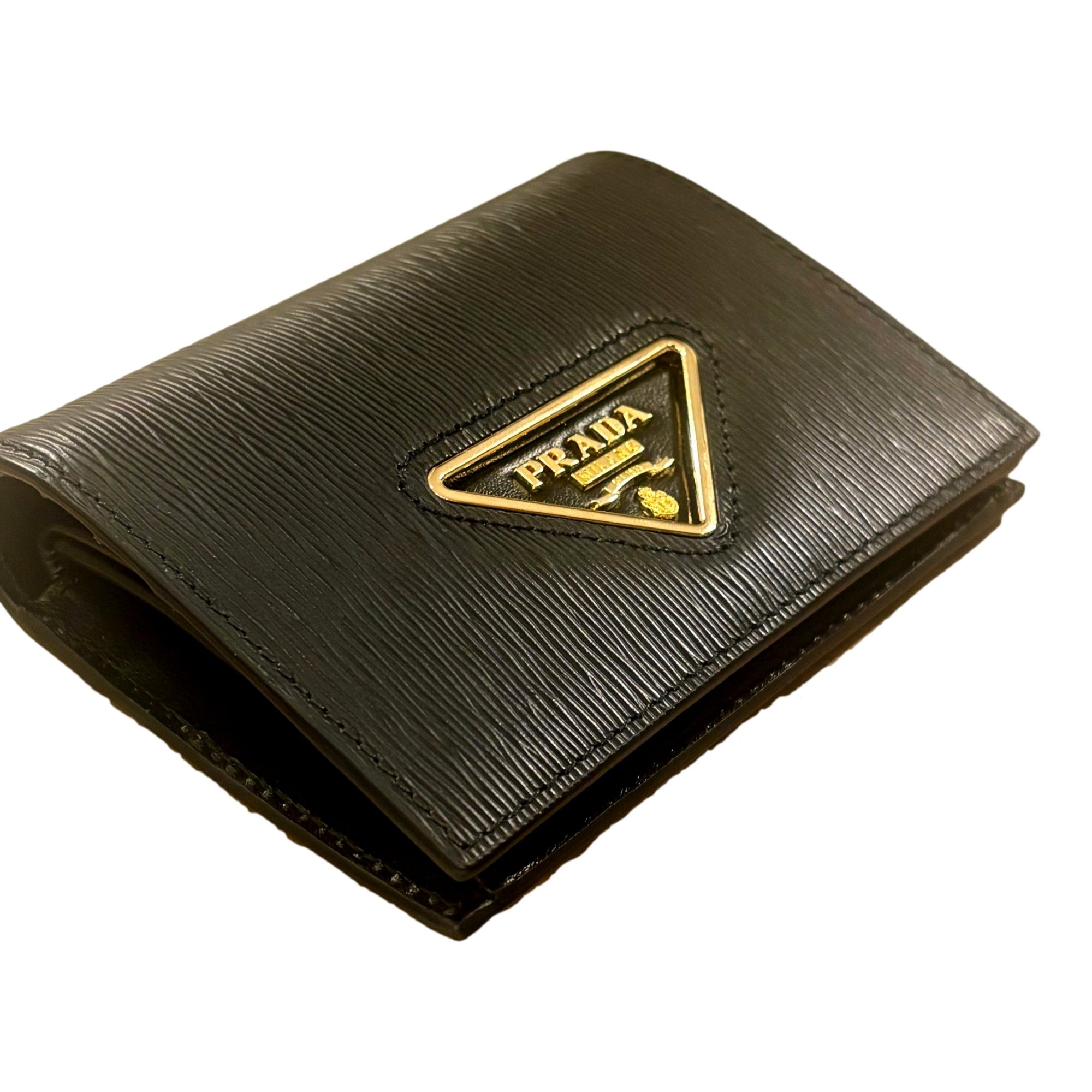 Prada Vitello Move Nero Black Triangle Logo Leather Bifold Snap Wallet available at Queen Bee of Beverly Hills