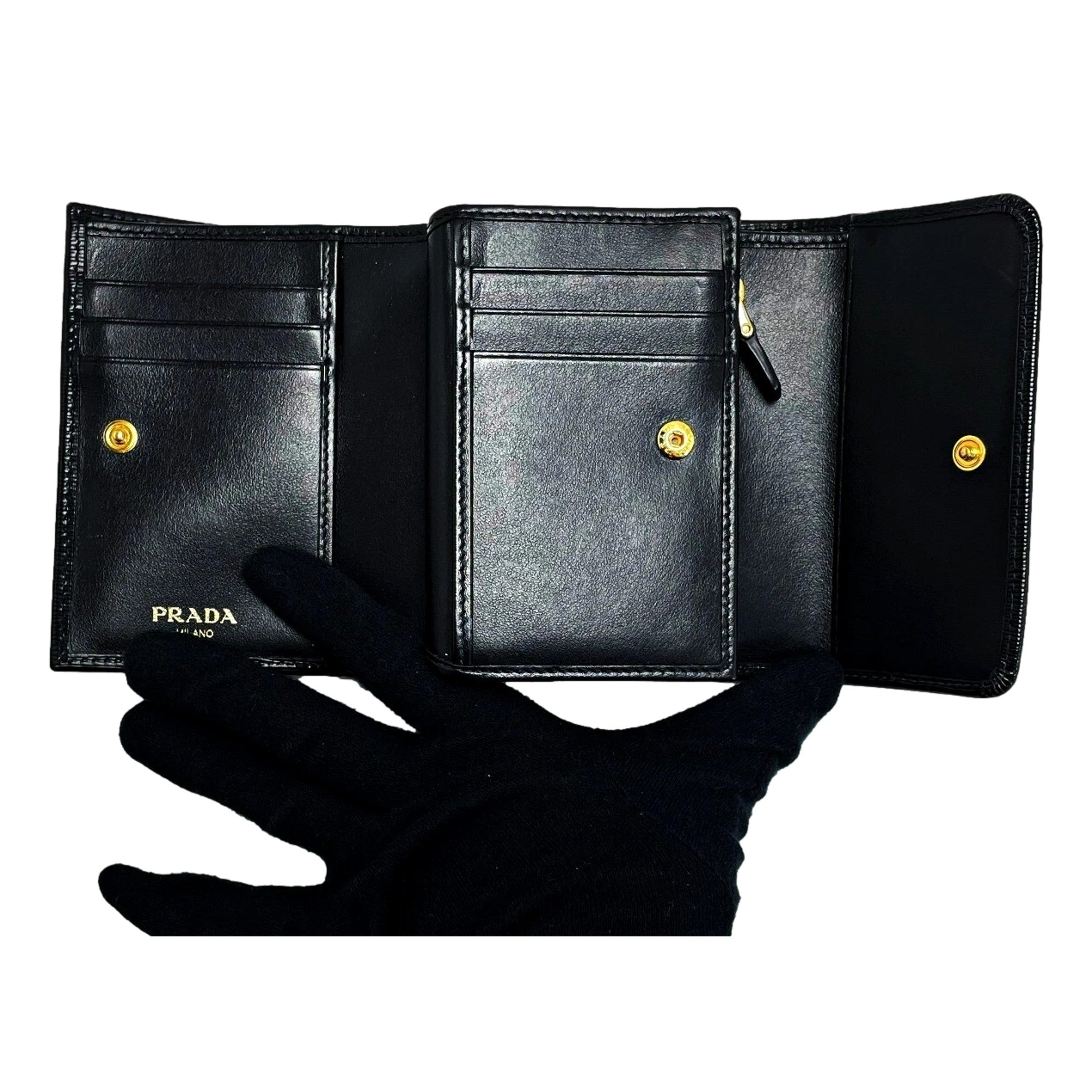 Prada Vitello Move Nero Black Trifold Coin Zipper Snap Card Holder Wallet available at Queen Bee of Beverly Hills