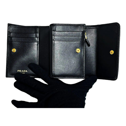 Prada Vitello Move Nero Black Trifold Coin Zipper Snap Card Holder Wallet available at Queen Bee of Beverly Hills
