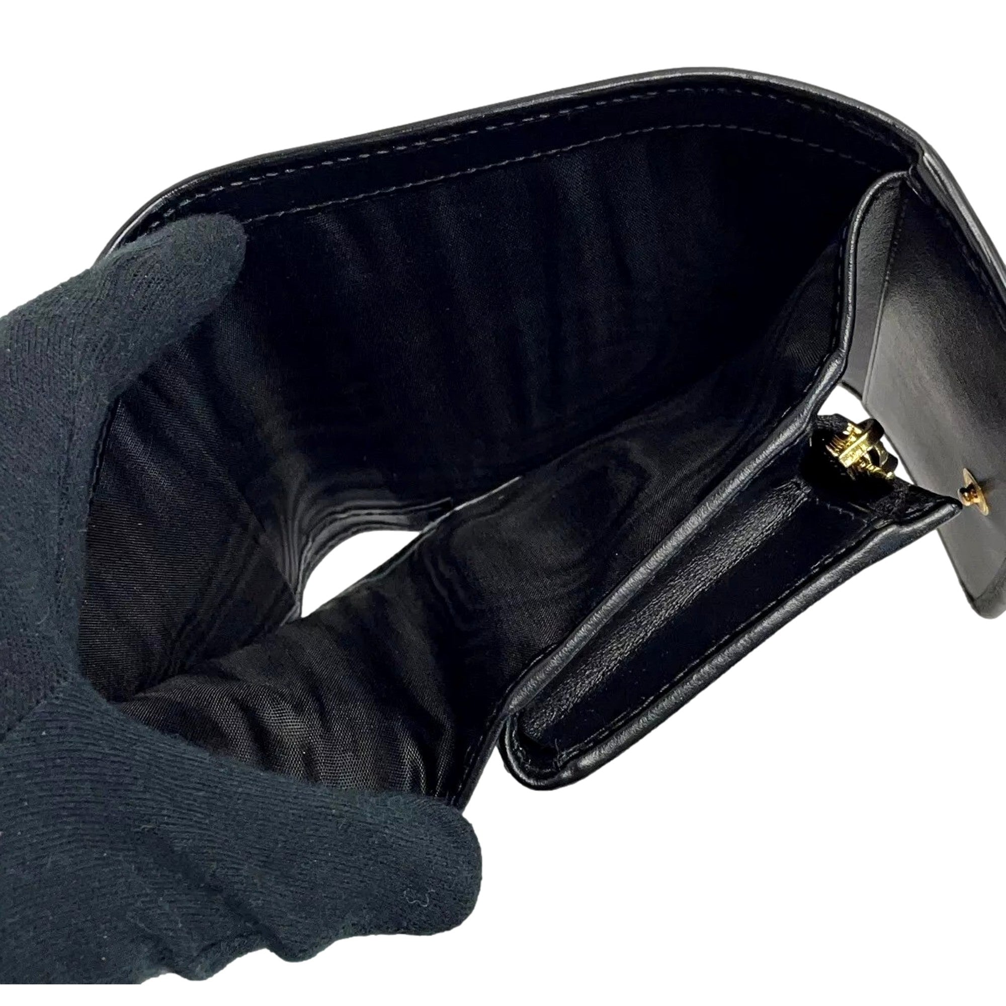 Prada Vitello Move Nero Black Trifold Coin Zipper Snap Card Holder Wallet available at Queen Bee of Beverly Hills