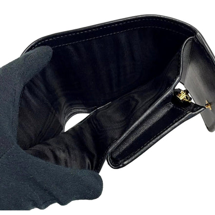 Prada Vitello Move Nero Black Trifold Coin Zipper Snap Card Holder Wallet available at Queen Bee of Beverly Hills