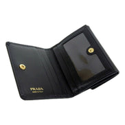 Prada Vitello Move Nero Black Trifold ID Holder Snap Wallet available at Queen Bee of Beverly Hills