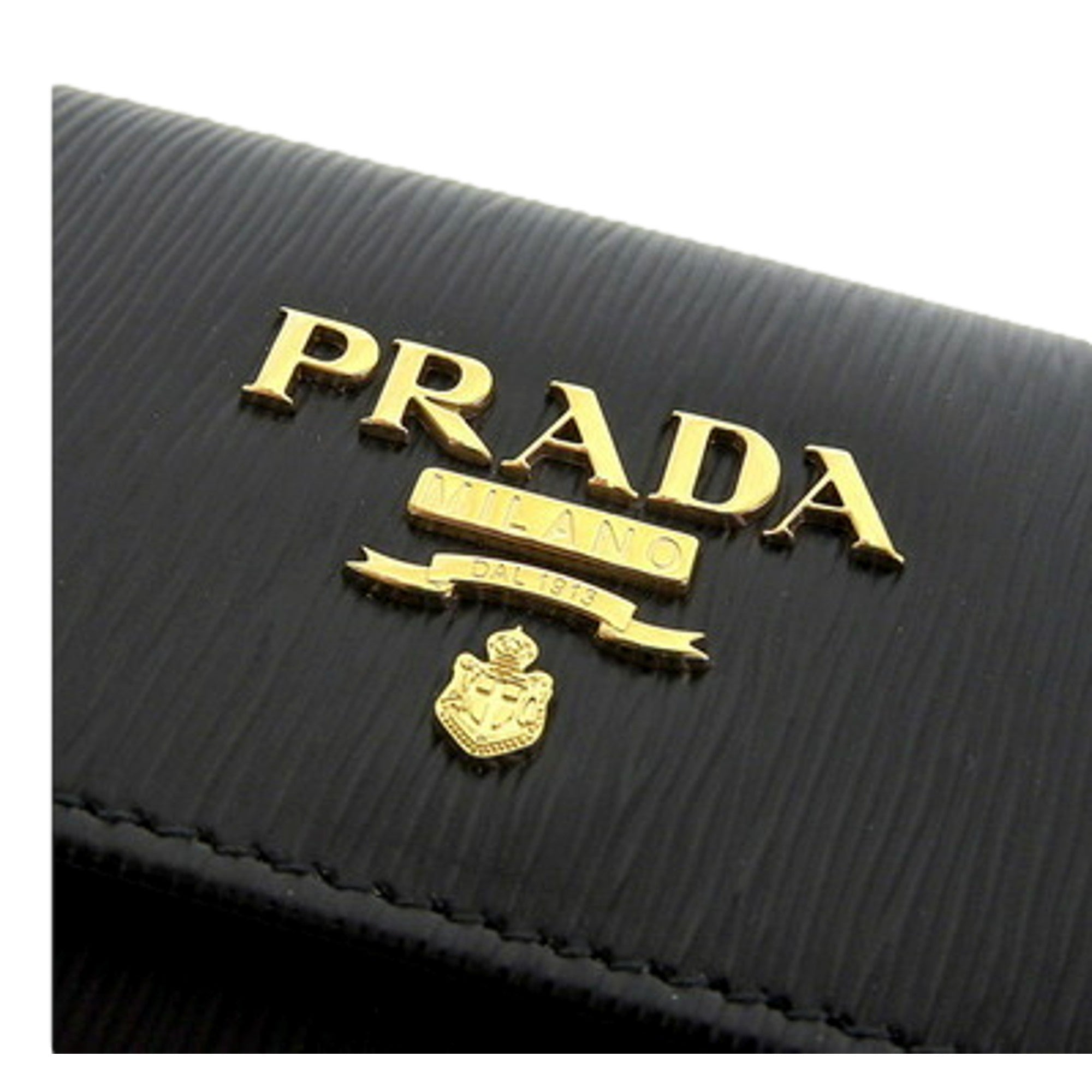 Prada Vitello Move Nero Black Trifold ID Holder Snap Wallet available at Queen Bee of Beverly Hills
