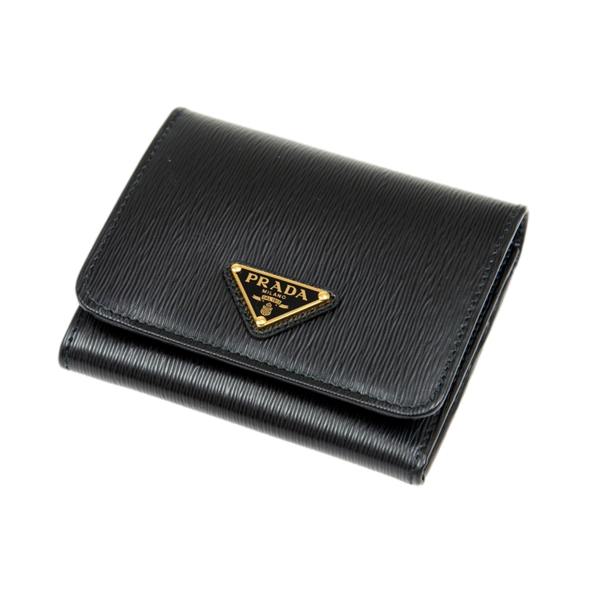 Prada Vitello Move Trifold Compact Wallet Black Leather Triangle Plaque available at Queen Bee of Beverly Hills