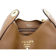 Prada Vitello Phenix Caramel Brown Leather Web Stripe Crossbody Bag available at Queen Bee of Beverly Hills