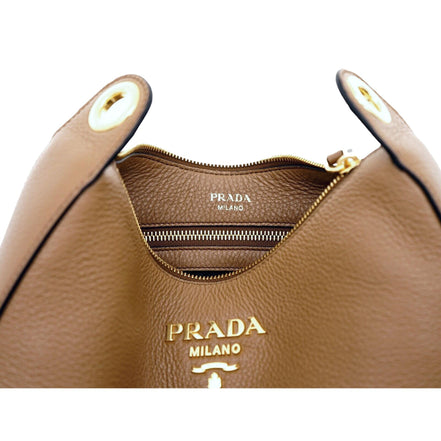 Prada Vitello Phenix Caramel Brown Leather Web Stripe Crossbody Bag available at Queen Bee of Beverly Hills