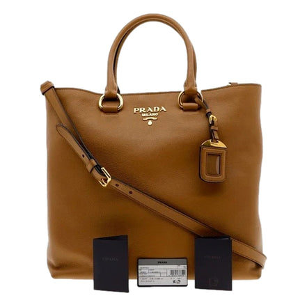 Prada Vitello Phenix Caramel Brown Shopping Tote Bag available at Queen Bee of Beverly Hills