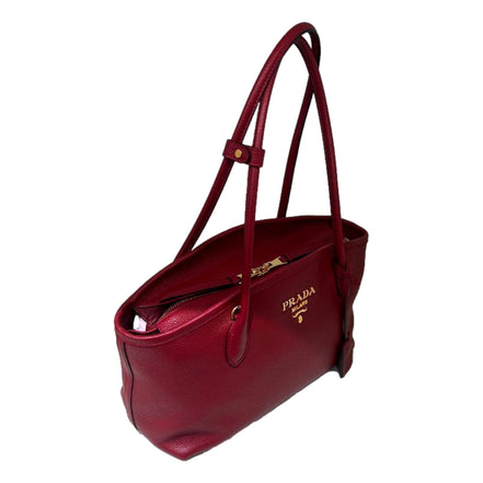 Prada Vitello Phenix Leather Rubino Red Top Handle Shoulder Bag available at Queen Bee of Beverly Hills