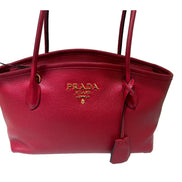 Prada Vitello Phenix Leather Rubino Red Top Handle Shoulder Bag available at Queen Bee of Beverly Hills
