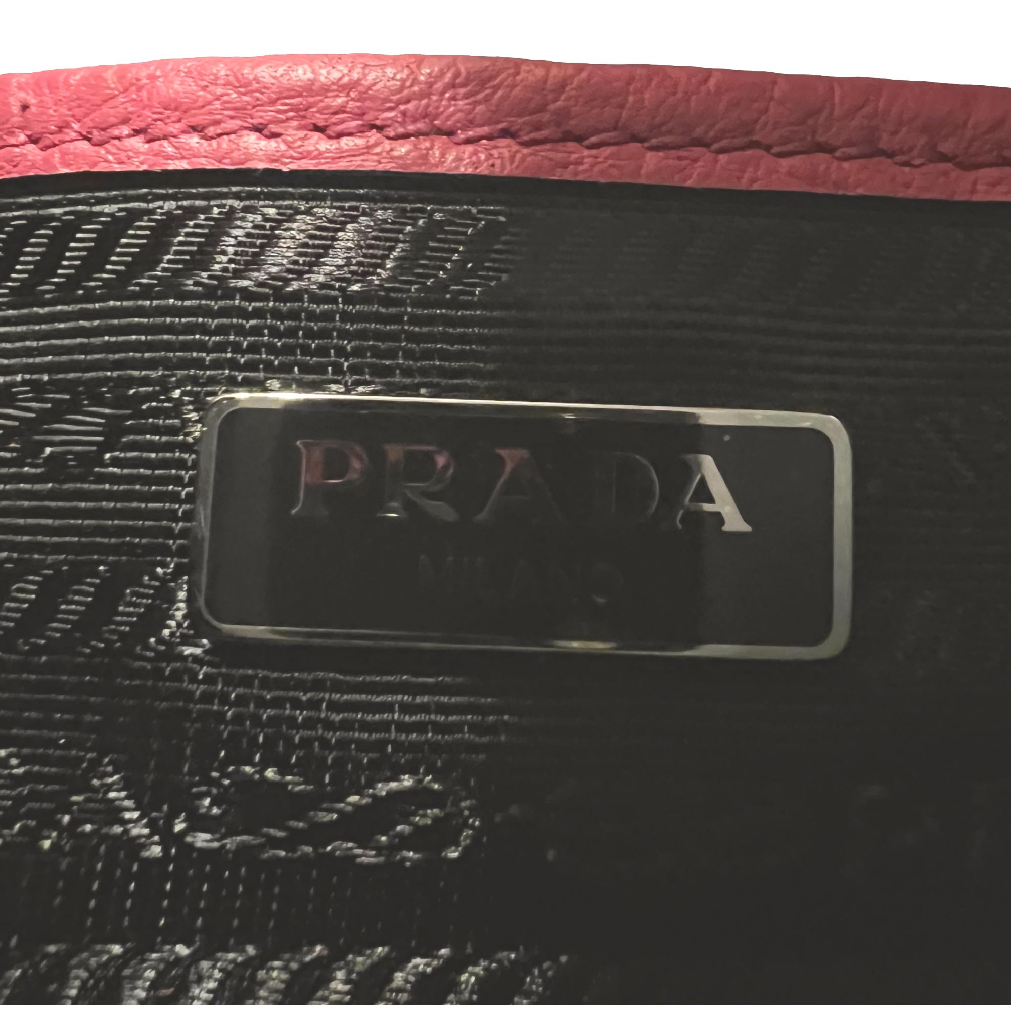 Prada Vitello Phenix Pink Leather Silver Logo Small Camera Crossbody Bag available at Queen Bee of Beverly Hills