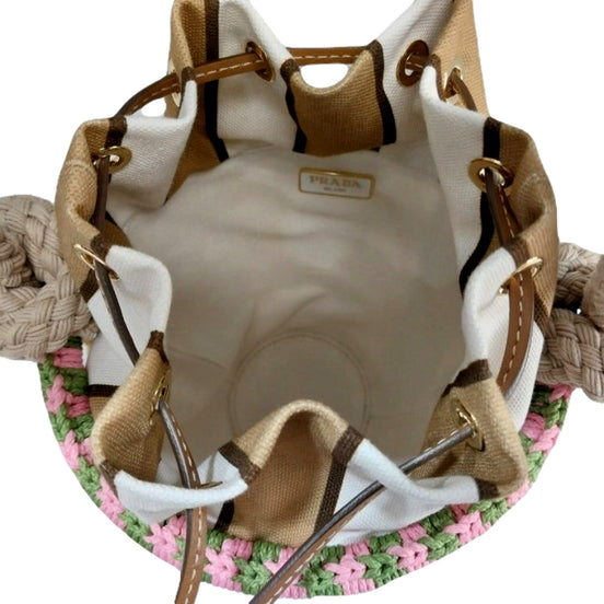 Prada Beige Wicker Mini Bucket Bag with Pink and Green Rope Trim and Tan Leather - available at Queen Bee of Beverly Hills. 