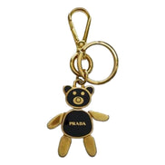 Prada Women's Black/Gold Teddy Bear Handbag Charm Keychain available at Queen Bee of Beverly Hills