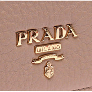 Prada Women's Vitello Grain Cammeo Beige Leather Card Case Wallet available at Queen Bee of Beverly Hills