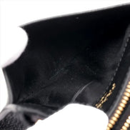 Prada Womens Vitello Grain Nero Black Leather Zip Top Card Wallet available at Queen Bee of Beverly Hills