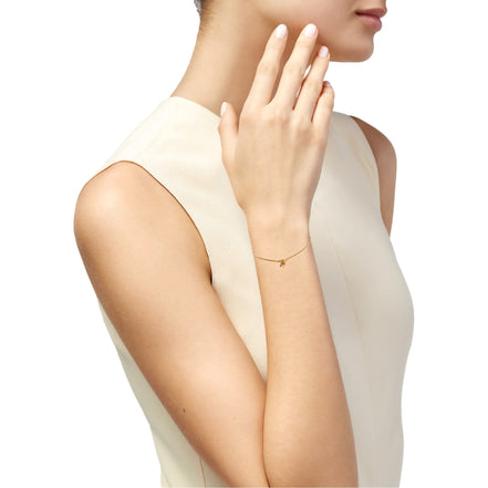 Saint Laurent Monogram Twist Gold Metal Chain Bracelet available at Queen Bee of Beverly Hills