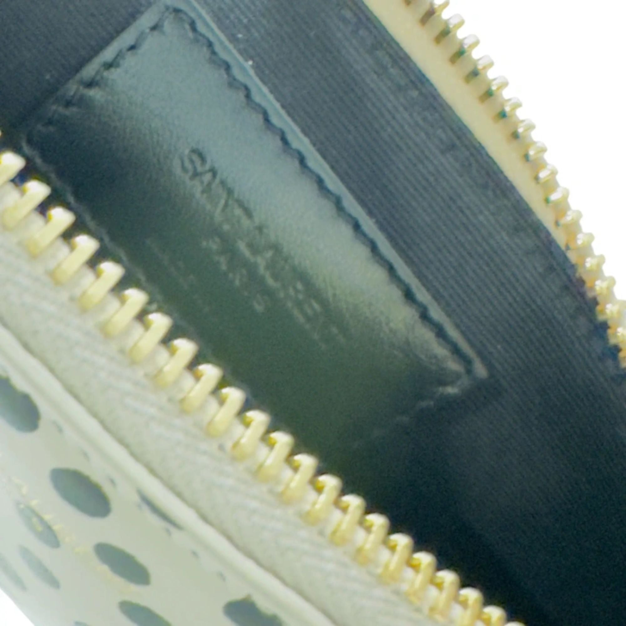 Saint Laurent Polka Dot Calfskin Leather Small Pouch available at Queen Bee of Beverly Hills