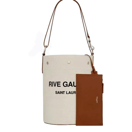 Saint Laurent Rive Gauche Brown Leather Trim Linen Bucket Bag available at Queen Bee of Beverly Hills