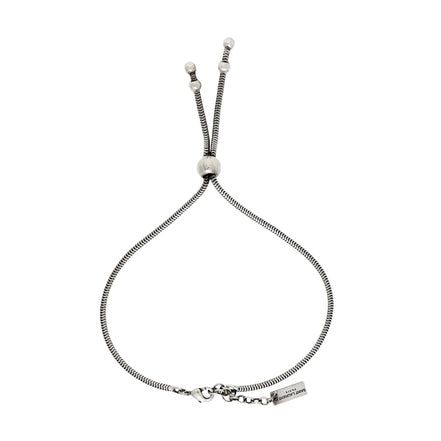 Saint Laurent Silver Bolo Tie Bracelet Large available at Queen Bee of Beverly Hills