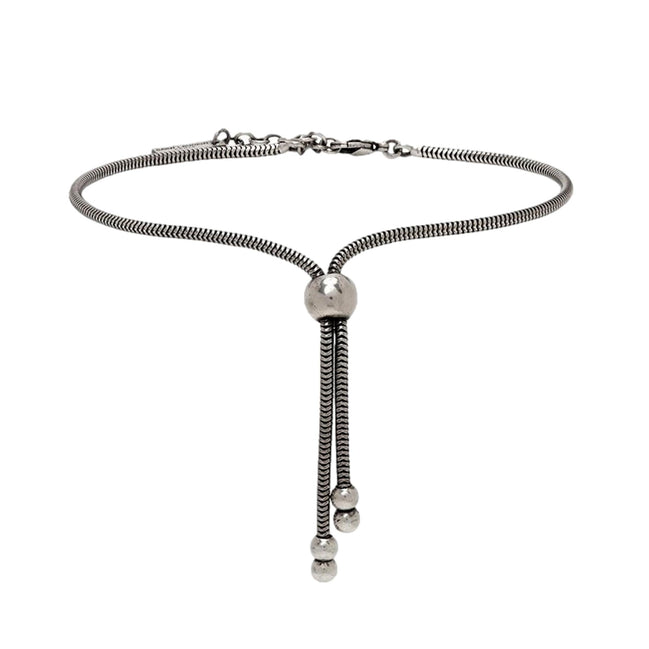 Saint Laurent Silver Bolo Tie Bracelet Large available at Queen Bee of Beverly Hills