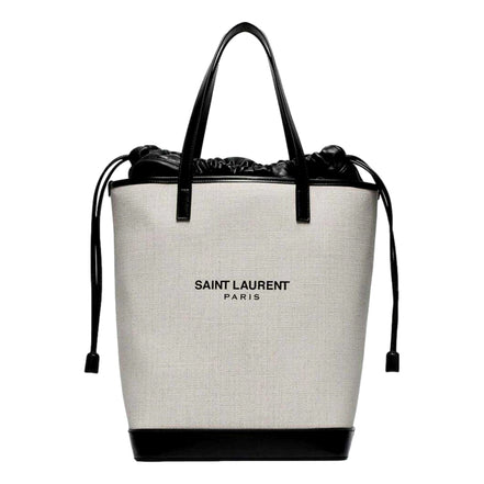 Saint Laurent Teddy White Coated Linen Drawstring Bucket Bag available at Queen Bee of Beverly Hills