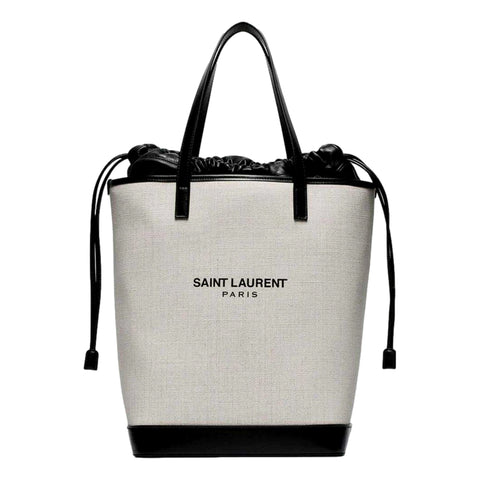 Saint Laurent Teddy White Coated Linen Drawstring Bucket Bag available at Queen Bee of Beverly Hills
