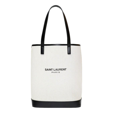 Saint Laurent Teddy White Coated Linen Drawstring Bucket Bag available at Queen Bee of Beverly Hills