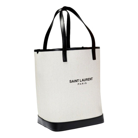 Saint Laurent Teddy White Coated Linen Drawstring Bucket Bag available at Queen Bee of Beverly Hills