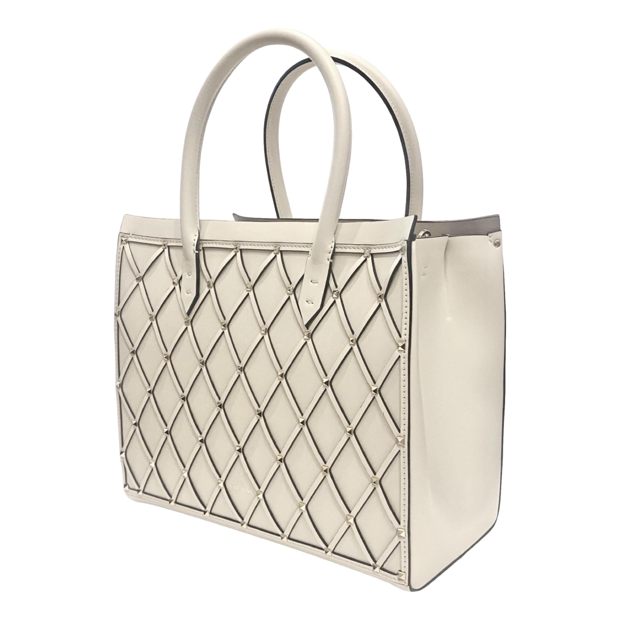 Valentino Garavani Beehive Lattice Ivory Studded Leather Crossbody Tote available at Queen Bee of Beverly Hills