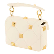Valentino Garavani Roman Stud Small Crossbody Bag Ivory Nappa Leather available at Queen Bee of Beverly Hills
