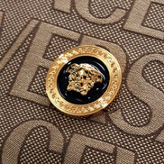 Detail image of Versace Canvas La Medusa Logo Print Small Crossbody Bag available at Queen Bee of Beverly Hills