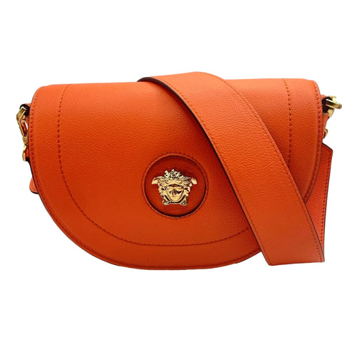 Versace Half-Moon La Medusa Vitello Leather Orange Crossbody Handbag available at Queen Bee of Beverly Hills