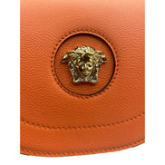 Versace Half-Moon La Medusa Vitello Leather Orange Crossbody Handbag available at Queen Bee of Beverly Hills