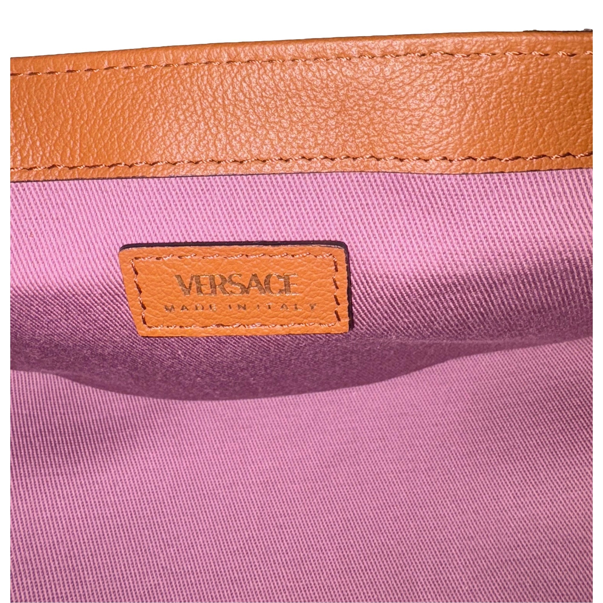 Versace Half-Moon La Medusa Vitello Leather Summer Nude Brown Crossbody Handbag available at Queen Bee of Beverly Hills