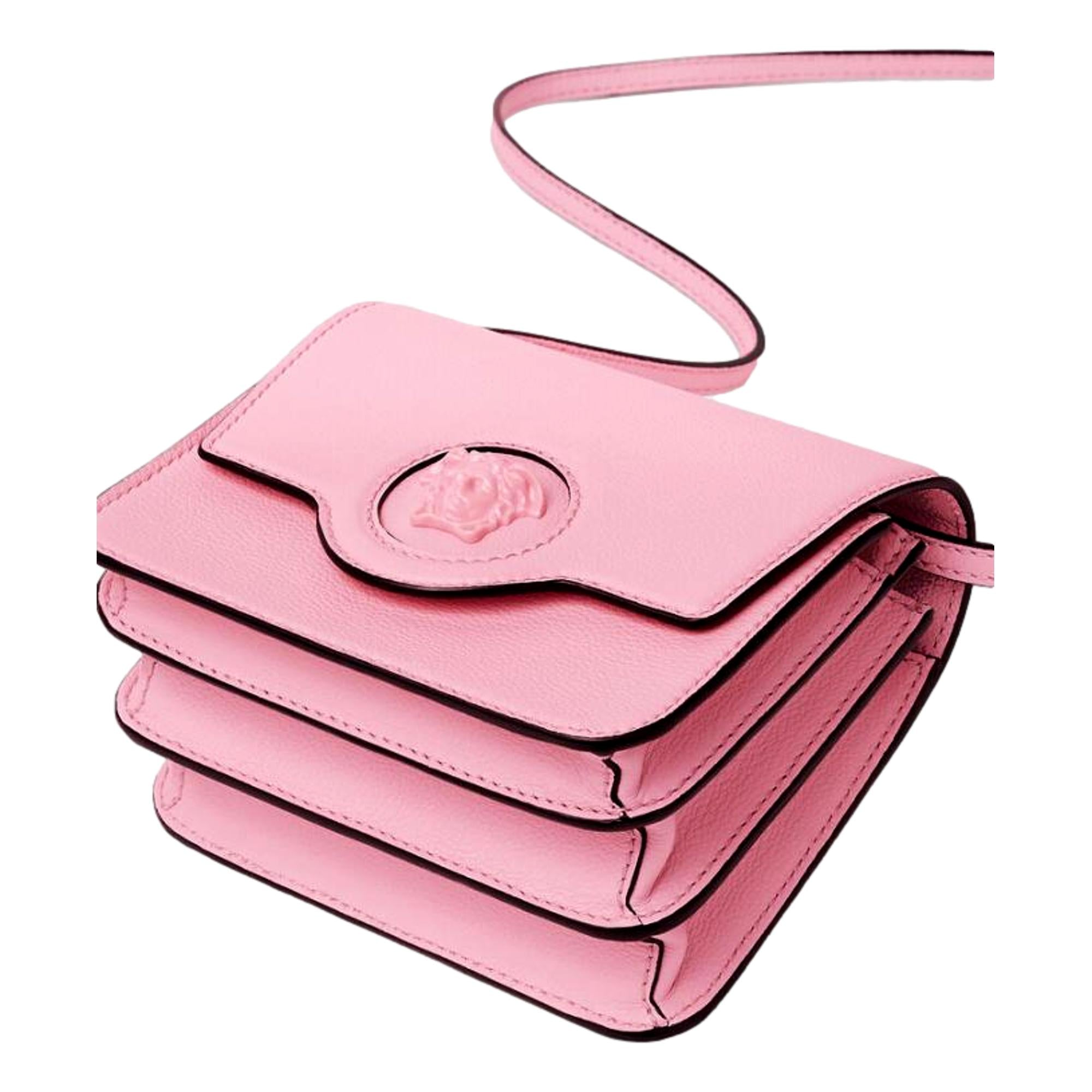 Versace La Medusa Logo Plaque Pink Pebbled Leather Crossbody Bag available at Queen Bee of Beverly Hills