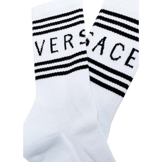 Versace White Black 90s Style Vintage Logo Tube Socks Medium available at Queen Bee of Beverly Hills