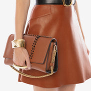 Alexander McQueen The Story Knotted Brown Handbag available at Queen Bee of Beverly Hills