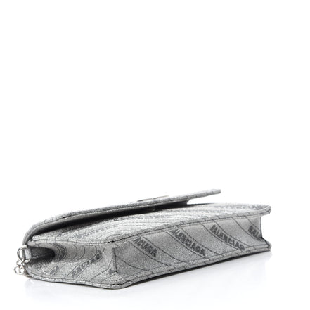 Balenciaga BB Silver Glittered Leather Wallet on Chain Bag available at Queen Bee of Beverly Hills