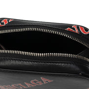 Balenciaga Black Calfskin Leather Sport Print Phone Holder Bag available at Queen Bee of Beverly Hills